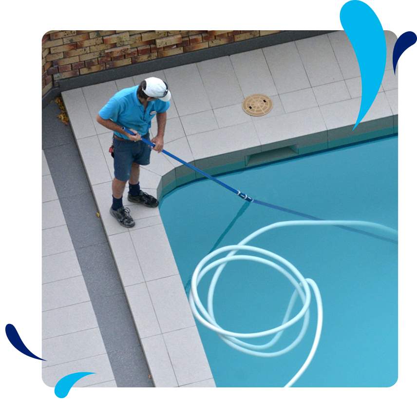 A man cleaning a pool