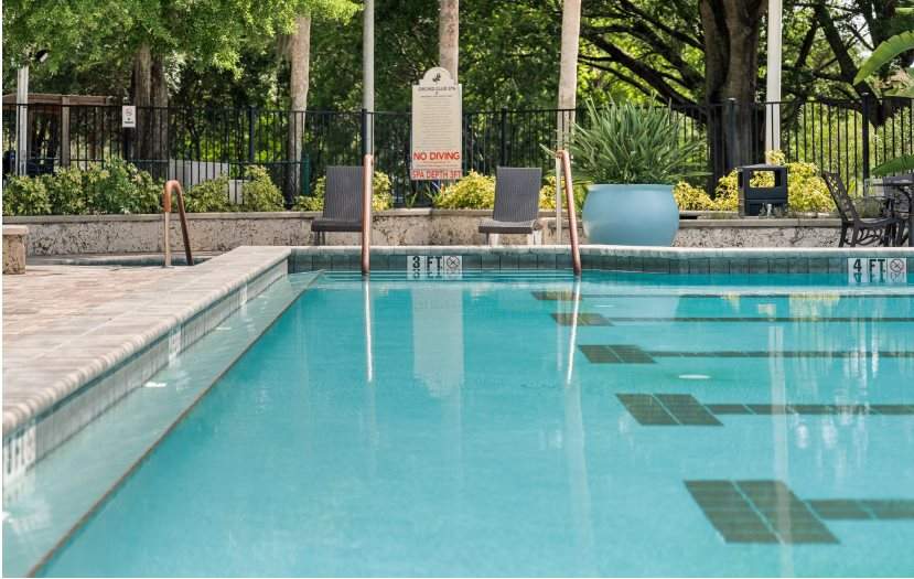 A lap pool with handrails